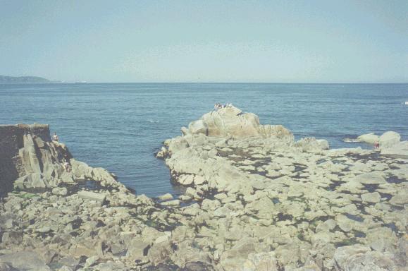 The Bailey Light is at the tip of Howth, to the left